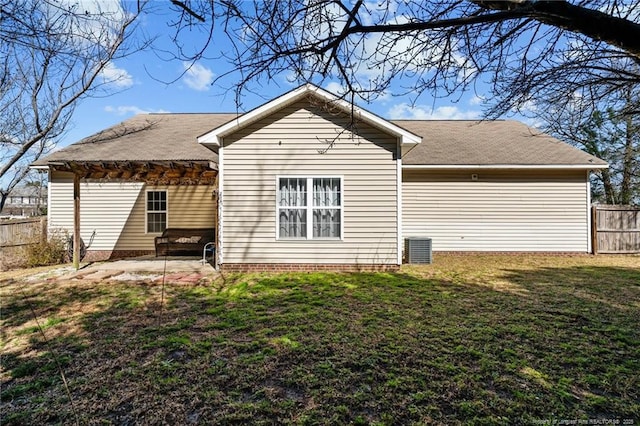 back of property featuring a yard, a patio, a pergola, and fence