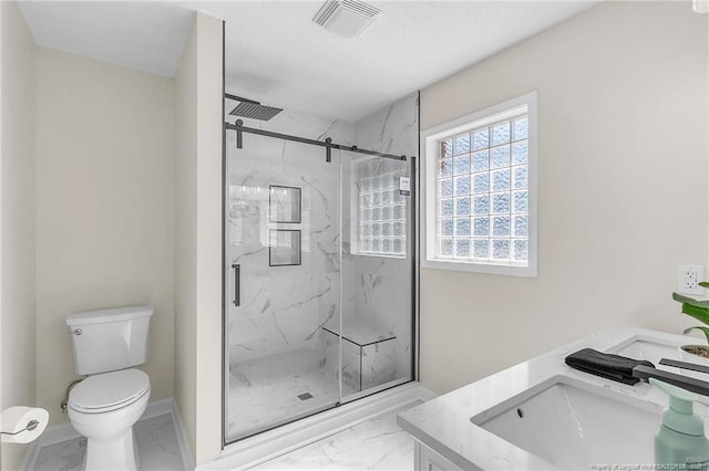 full bathroom with a marble finish shower, visible vents, toilet, marble finish floor, and a sink