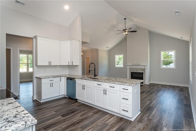 5814 James Allen Ln, Stedman, NC 28391 - kitchen with dishwasher, a peninsula, ceiling fan, white cabinetry, and light stone counters