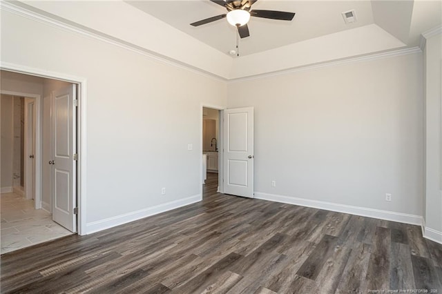 5814 James Allen Ln, Stedman, NC 28391 - unfurnished room featuring a ceiling fan, wood finished floors, a raised ceiling, and crown molding