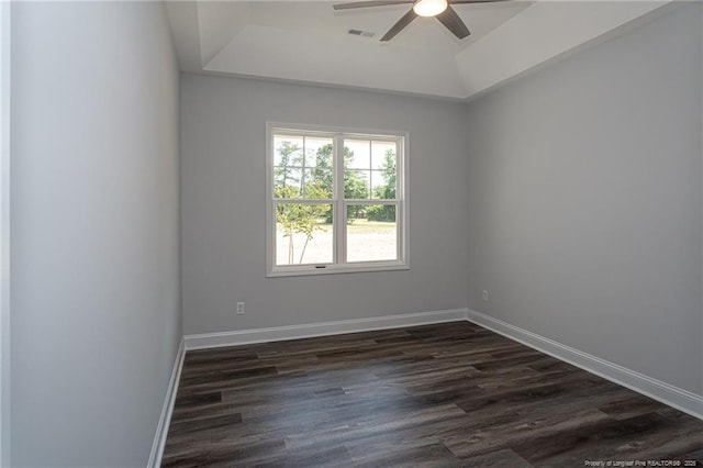 5814 James Allen Ln, Stedman, NC 28391 - empty room with a tray ceiling, a ceiling fan, and dark wood finished floors