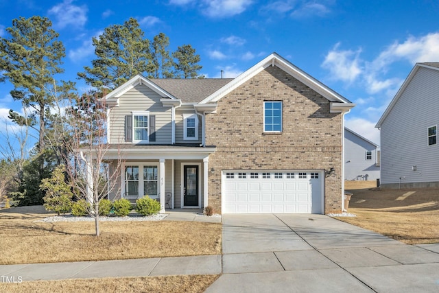 traditional-style house featuring brick siding, covered porch, concrete driveway, and a garage