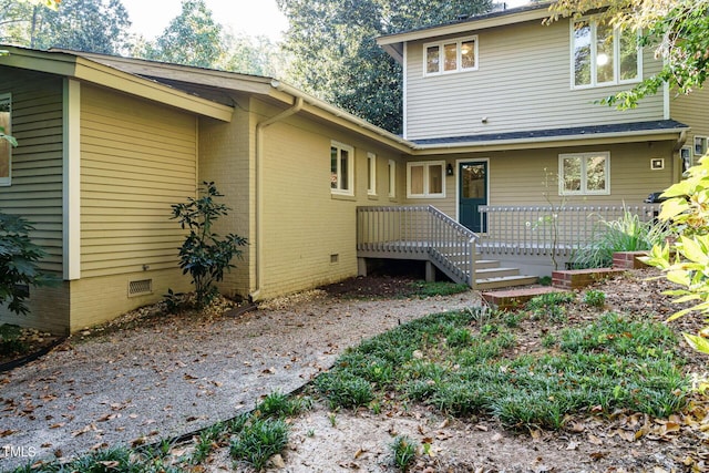 exterior space with crawl space