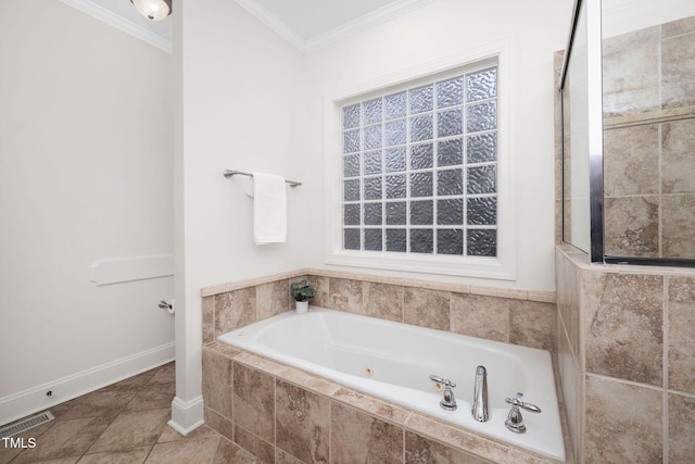 bathroom with tile patterned flooring, visible vents, baseboards, a whirlpool tub, and ornamental molding