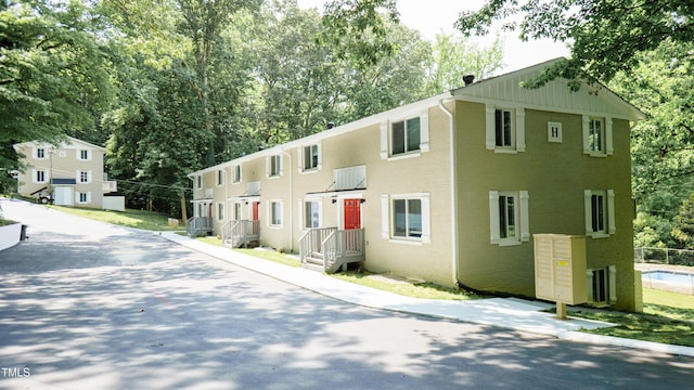800 Pritchard Avenue Extension Unit H3, Chapel Hill, NC 27516 - townhome / multi-family property with brick siding and view of scattered trees