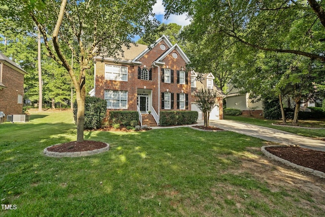 colonial-style house featuring concrete driveway, brick siding, and a front lawn