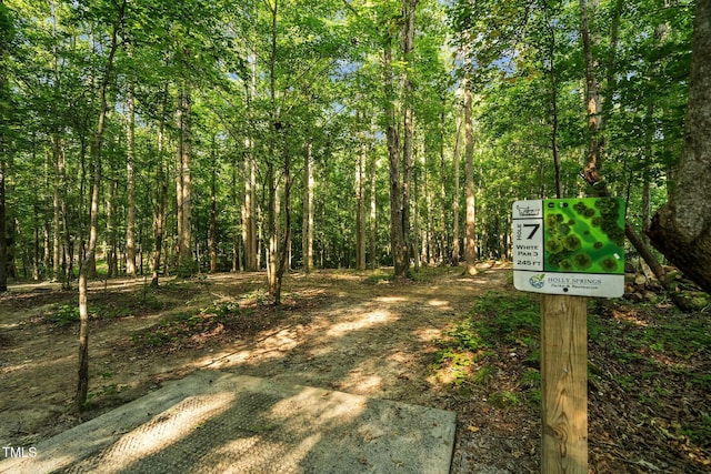 exterior space with a view of trees