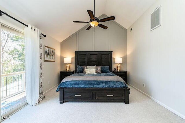 bedroom featuring access to outside, multiple windows, visible vents, and light carpet