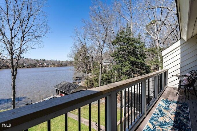 balcony featuring a water view