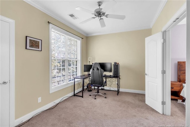 office area featuring carpet flooring, visible vents, baseboards, and ornamental molding