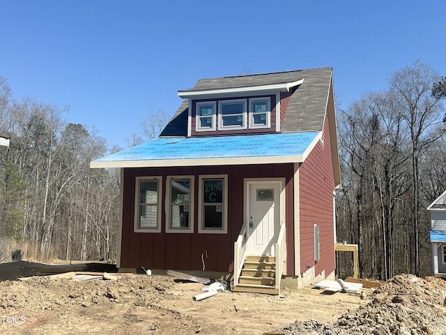 view of front of home featuring entry steps and board and batten siding