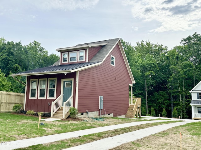 view of front of property featuring entry steps, crawl space, and stairs