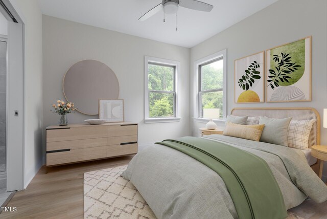 1448C Maplewood Dr, Durham, NC 27704 - bedroom with light wood-style floors and ceiling fan