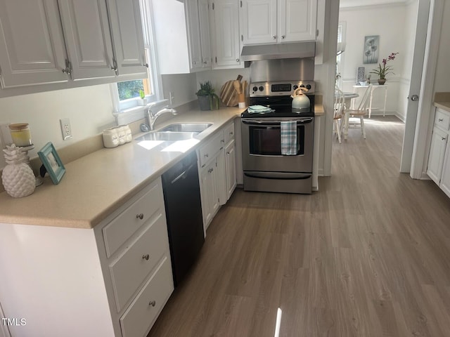 kitchen with a sink, white cabinets, electric stove, under cabinet range hood, and dishwasher