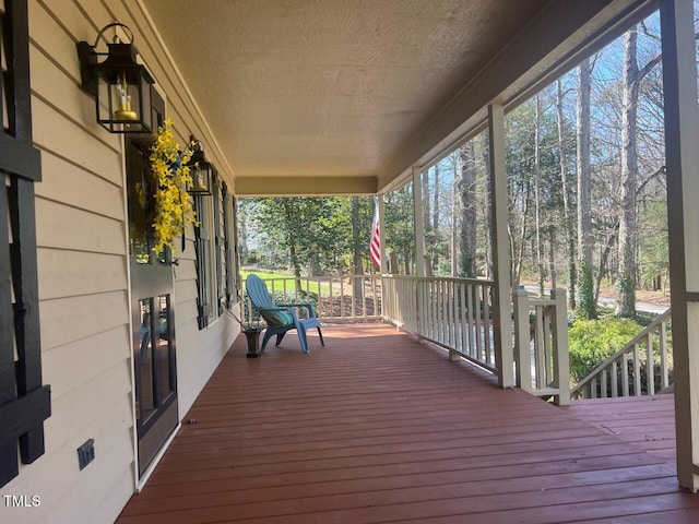 wooden terrace with covered porch