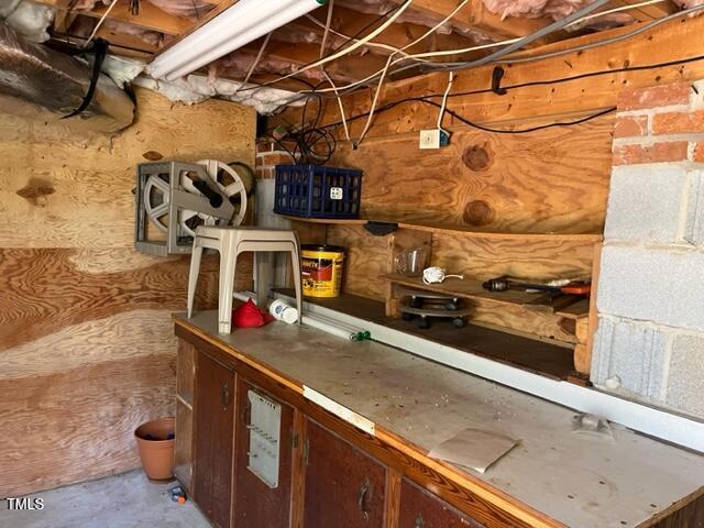 interior space with unfinished concrete flooring