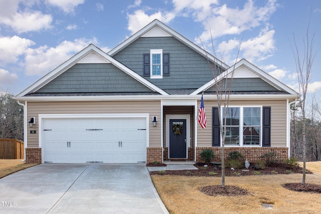 craftsman-style home with a garage, brick siding, and concrete driveway