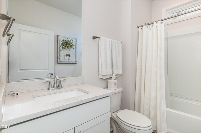 bathroom with toilet, shower / bath combo, and vanity