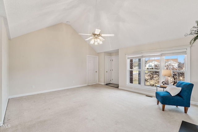 unfurnished room with visible vents, high vaulted ceiling, a ceiling fan, carpet, and baseboards