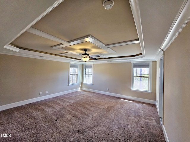 carpeted spare room featuring a healthy amount of sunlight, baseboards, coffered ceiling, and ornamental molding