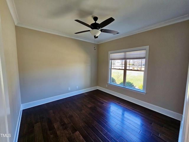 unfurnished room featuring dark wood-style floors, ceiling fan, crown molding, and baseboards