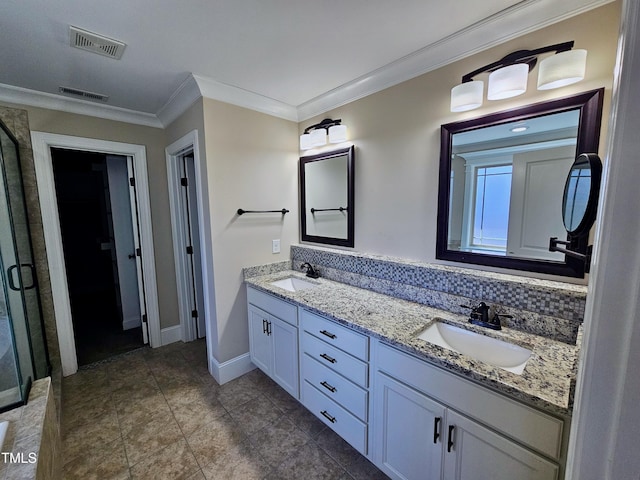 full bathroom featuring a sink, visible vents, and crown molding