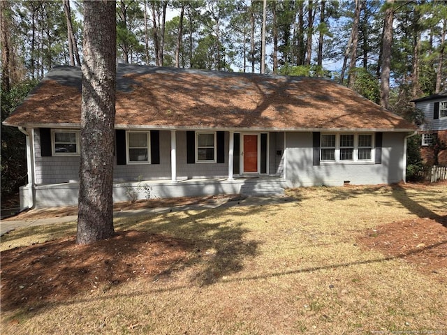 view of front of property with crawl space, covered porch, and a front lawn