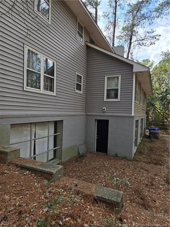 back of property with brick siding