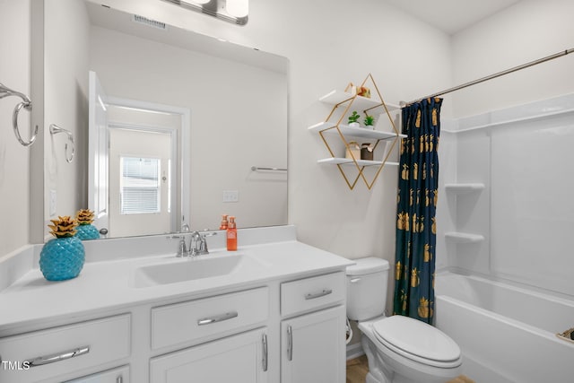 bathroom featuring vanity, shower / bath combination with curtain, toilet, and visible vents