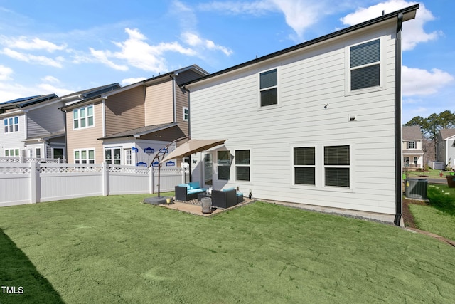 back of house featuring an outdoor living space, a yard, central AC unit, and a fenced backyard