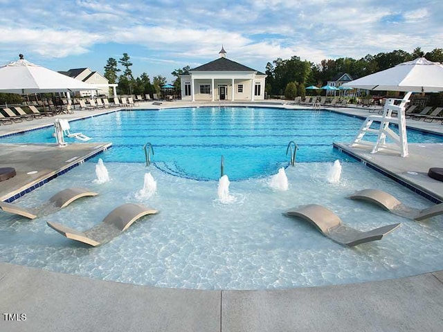 pool with a patio area