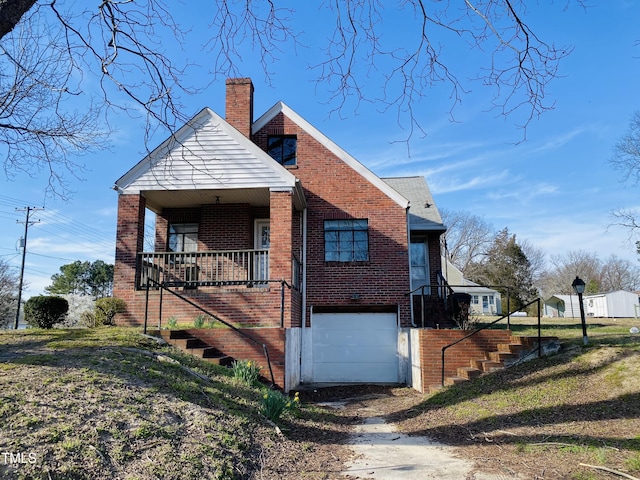 view of home's exterior with brick siding, an attached garage, a chimney, and stairs