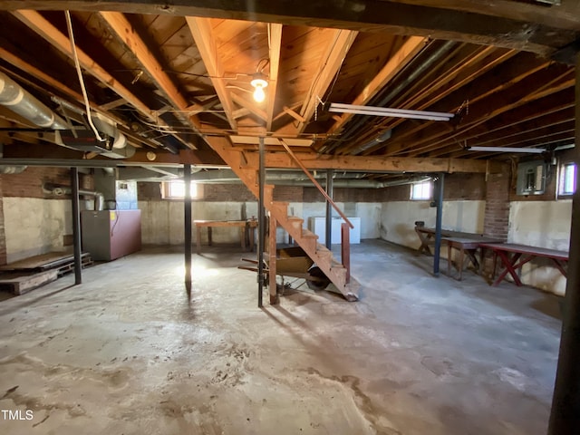 basement featuring heating unit