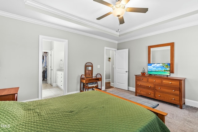 238 Ashpole Trl, Clayton, NC 27520 - bedroom featuring ornamental molding, a raised ceiling, a ceiling fan, and ensuite bath