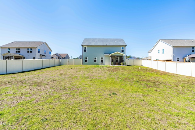238 Ashpole Trl, Clayton, NC 27520 - rear view of house with a fenced backyard