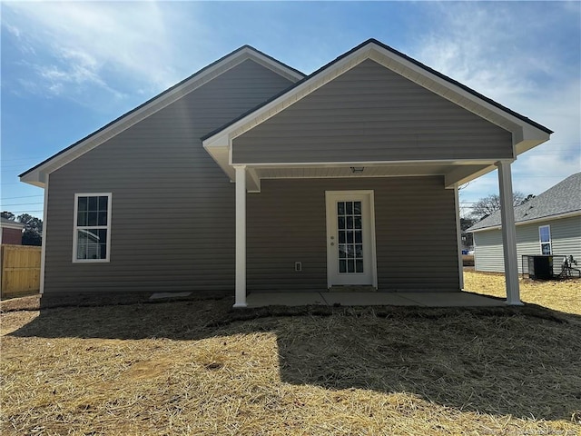 back of property with fence