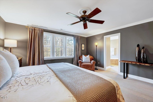 bedroom featuring a ceiling fan, baseboards, ensuite bath, ornamental molding, and light carpet