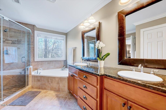 bathroom featuring a sink, double vanity, a bath, and crown molding