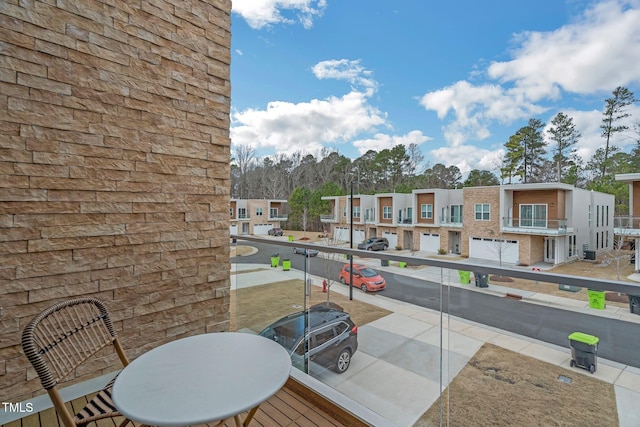 balcony featuring a residential view