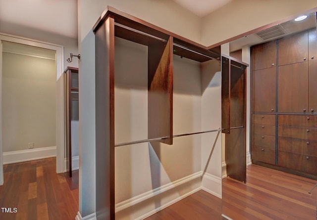 805 Greenwood Rd, Chapel Hill, NC 27514 - walk in closet with visible vents and wood finished floors