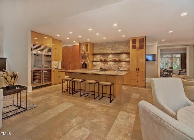 805 Greenwood Rd, Chapel Hill, NC 27514 - kitchen featuring open shelves, oven, recessed lighting, decorative backsplash, and a breakfast bar area
