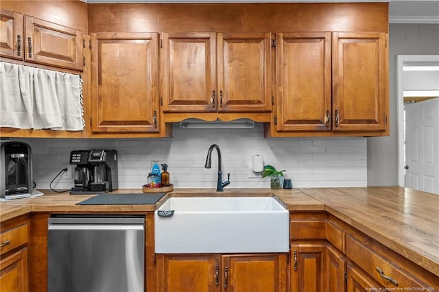 kitchen with a sink, brown cabinets, backsplash, and stainless steel dishwasher