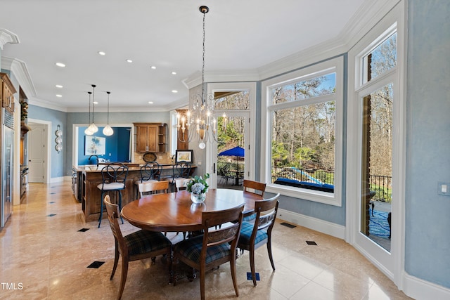 2421 Acanthus Dr, Wake Forest, NC 27587 - dining room featuring recessed lighting, light tile patterned floors, baseboards, and crown molding