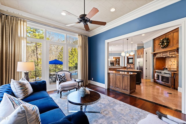2421 Acanthus Dr, Wake Forest, NC 27587 - living room with ornamental molding, dark wood-type flooring, a ceiling fan, and baseboards