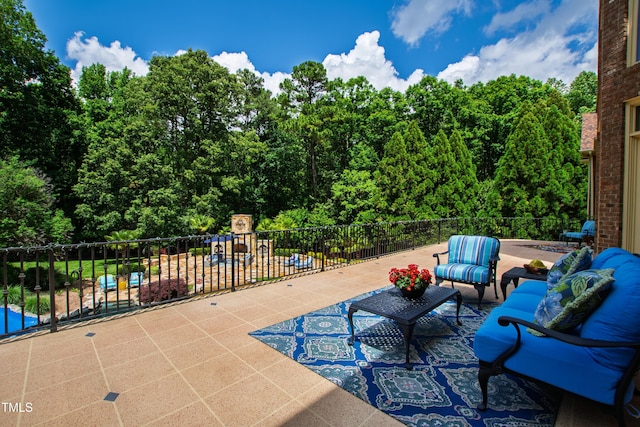 2421 Acanthus Dr, Wake Forest, NC 27587 - view of patio / terrace featuring an outdoor living space