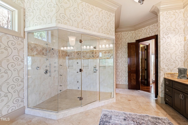2421 Acanthus Dr, Wake Forest, NC 27587 - bathroom featuring wallpapered walls, ornamental molding, a stall shower, vanity, and baseboards