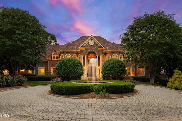 2421 Acanthus Dr, Wake Forest, NC 27587 - colonial inspired home featuring curved driveway and brick siding