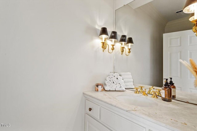 bathroom featuring vanity and crown molding