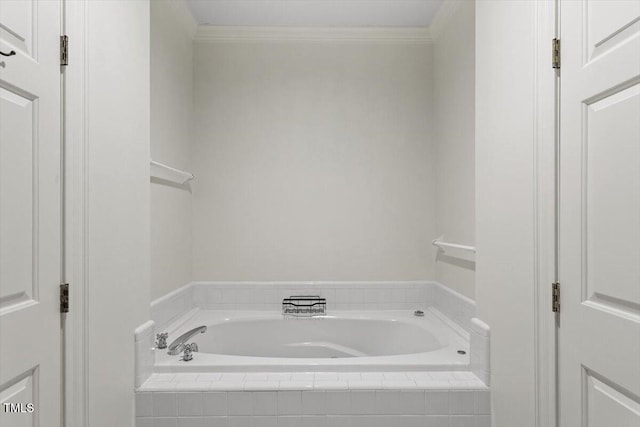 full bath with crown molding and a garden tub