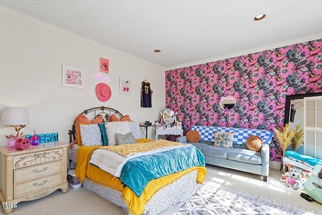 bedroom with recessed lighting, carpet, ornamental molding, and an accent wall